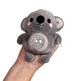 Kawaii koala gel bead belly squeeze plush toy being held in a hand with the clear gel bead belly pushed out through the transparent window on the grey soft body