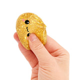 Keycraft Lucky Bao gold glitter squishy dumpling fidget toy squeezed in hand