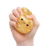 Keycraft Lucky Bao large gold glitter squishy dumpling fidget toy squeezed in hand