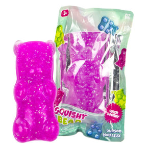 Pink Keycraft Squishy Bear glitter gummy squishy beside its retail packaging