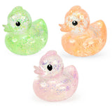 Green, peach and pink glitter Keycraft squishy ducks, clear stretchy duck sensory toys