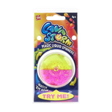 Close-up overhead view of pink and yellow Lava Storm liquid spinner in motion on black surface