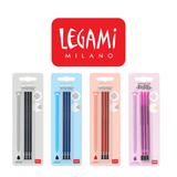 Four packs of Legami erasable gel pen ink refills in black, blue, red and purple beside the Legami Milano logo