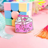 Lula Rocks Strawberry Milk enamel pin, pink colorway, pastel blocks lifestyle shot