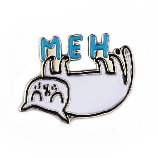 Meh Cat enamel pin featuring a grumpy speech bubble cat with X eyes and MEH text in blue letters
