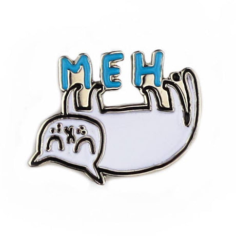 Meh Cat enamel pin featuring a grumpy speech bubble cat with X eyes and MEH text in blue letters