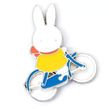 Official Miffy on bicycle enamel pin badge with spinning wheels, front view