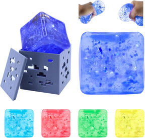 Blue Minecraft Jelly SquishMe cube in packaging and squeezed, glitter squishy fidget toy