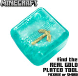 Teal Minecraft Jelly SquishMe cube, gold-plated tool chase piece, squishy fidget toy