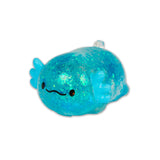 Blue glitter axolotl squishy lying on white background showing teal fin details