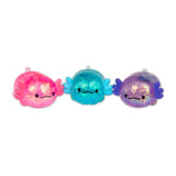 Pink, blue and purple glitter axolotl squishies displayed together in a row