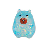 Blue iridescent glitter gel capybara squishy on white background showing sparkly gel body and red nose detail
