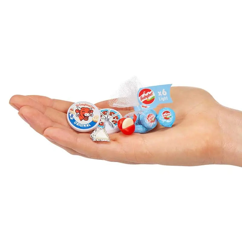 MGA Miniverse Real Brands miniature Laughing Cow and Babybel cheese collectibles displayed in a palm to show size