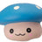 Close-up of blue kawaii squishy mushroom fidget toy with white spots and smiling face