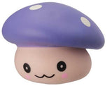 Close-up of purple kawaii squishy mushroom fidget toy with white spots and smiling face