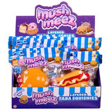 Mushmeez layered taba squishy blind bags in retail display box showing food character designs