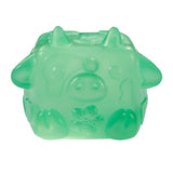 Green translucent MushyKinz Jelleez cow squishy with horns and flower detail