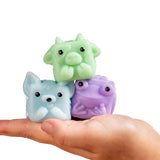 MushyKinz Mini Mystery Mushy pastel squishy figures stacked in hand