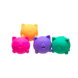 All four Nee Doh Teenie Cool Cat squishies grouped together showing pink, orange, purple and teal