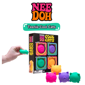 Hand squeezing teal Cool Cat squishy beside the Teenie Cool Cats gift box with four cats visible