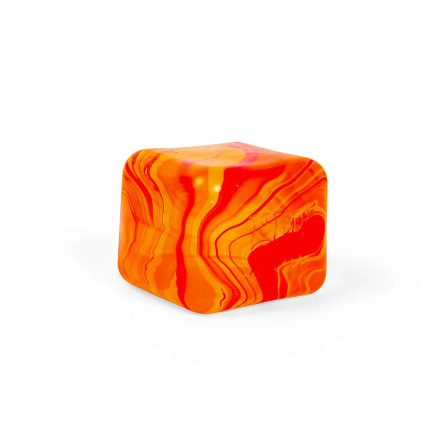 Orange and red marbled Nee Doh Nice Cube Swirl on a white background