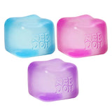 Three Nee Doh Nice Cubes in blue, pink and purple arranged together on a white background