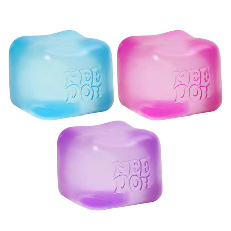Three Nee Doh Nice Cubes in blue, pink and purple arranged together on a white background