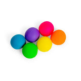 Six Nee Doh Rainbow Teenie squish balls grouped together showing all rainbow colours from above