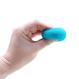 Hand holding a blue Nee Doh Teenie Fuzz Ball showing its soft spiky texture