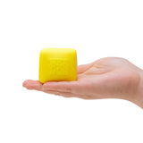 Yellow NeeDoh Colour Change Cube held in hand, fidget sensory toy