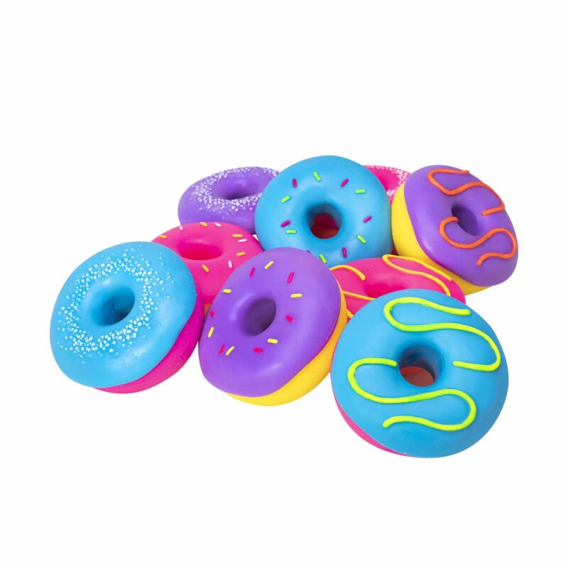 Large pile of nine NeeDoh Dohnut squishy toys in assorted colours and frosting designs