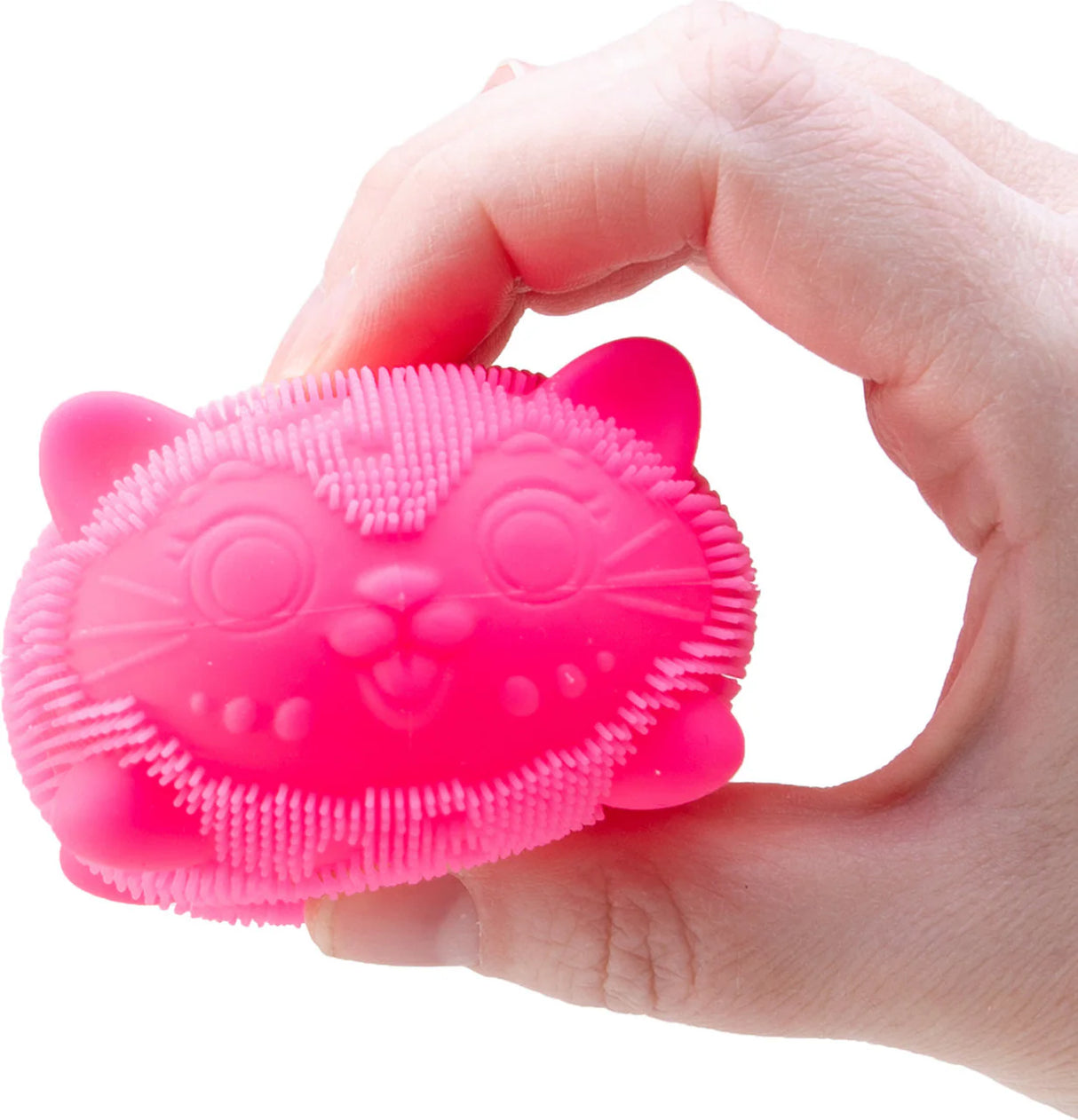 Nee Doh Fuzz Ball Wild Cats pink squishy cat sensory fidget toy held in hand
