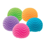 Five NeeDoh Fuzz Ball Wonder Waves sensory balls in blue, green, orange, pink and purple on white background