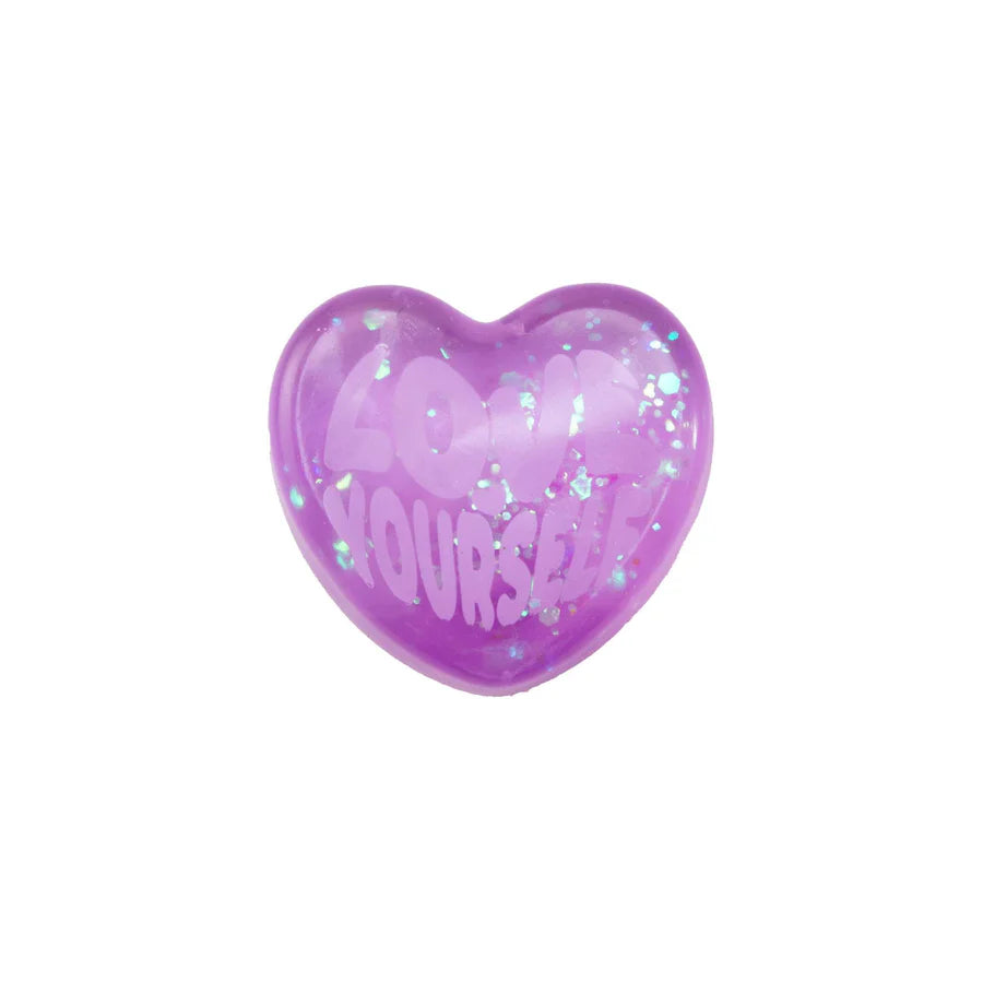 Purple glitter Nee Doh Good Vibes Only squish heart with Love Yourself embossed message on white background