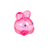 Close-up of pink glitter NeeDoh Jelly Hops squish bunny showing sparkle texture and paw details