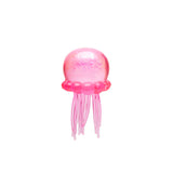 Pink glitter NeeDoh Jelly Squish jellyfish sensory toy on white background