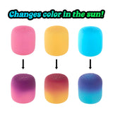 Three NeeDoh Mello Mallo toys showing before and after colour-change from pink to purple, yellow to amber, blue to violet
