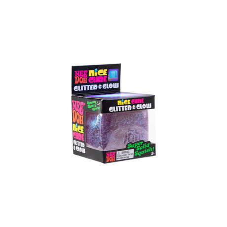 Purple NeeDoh Glitter and Glow Nice Cube sensory toy displayed in its branded black box