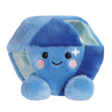 Aurora Palm Pals Alice Sapphire plush — a blue hexagonal gem-shaped soft toy with shimmery facets, rosy pink cheeks, a sparkle detail, and a cute smiling face