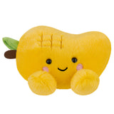 Plush toy shaped like a yellow fruit with a smiling face on a white background