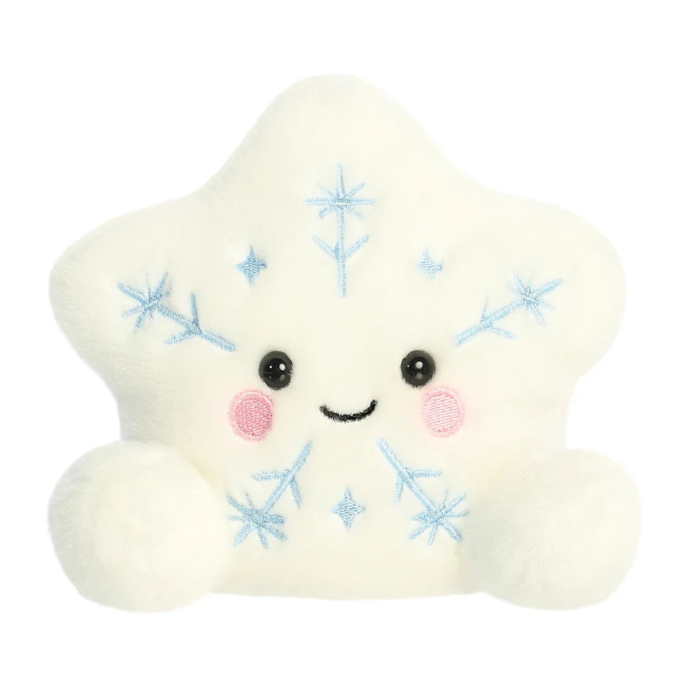 A cute, fluffy white plush toy shaped like a star, featuring embroidered light blue snowflakes, a black embroidered smiley face, and pink embroidered cheeks, set against a plain white background.