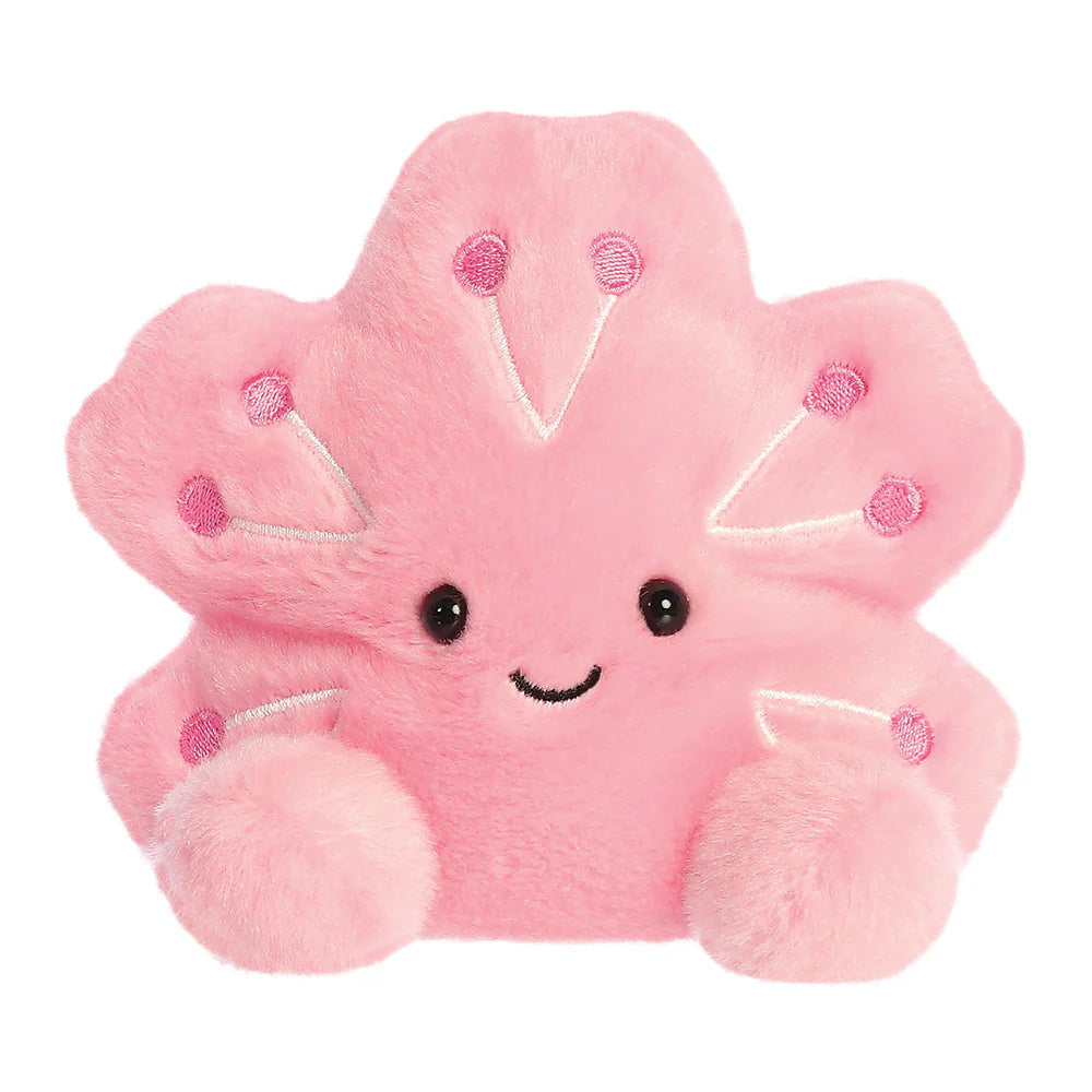 Aurora Palm Pals Hana Cherry Blossom plush — a pink five-petalled sakura flower soft toy with darker pink embroidered details, a smiling face, and rounded rounded feet