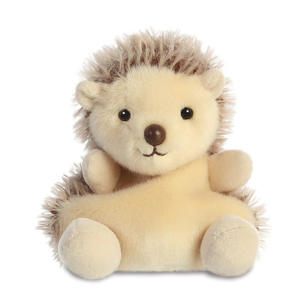 Palm Pals Hedgie Hedgehog plush, a small palm-sized stuffed hedgehog with a cream belly, spiky brown and beige quill-textured back, brown nose, and a sweet embroidered smile