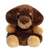 Plush dog toy with brown and beige fur on a white background
