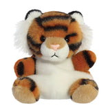 Aurora Palm Pals Indy Tiger plush — an orange and black striped tiger soft toy with a white chest and cheeks, fluffy white ear tufts, a pink nose, and a rounded seated pose