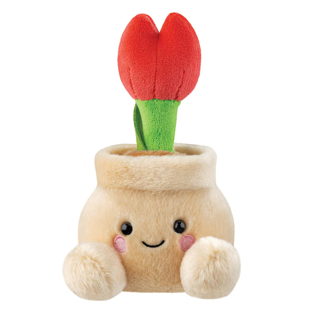Aurora Palm Pals Lilybelle Potted Tulip plush — a cream-coloured pot soft toy with a bright red tulip on a green stem growing from the top, with pink cheeks and a smiling face