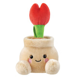 Aurora Palm Pals Lilybelle Potted Tulip plush — a cream-coloured pot soft toy with a bright red tulip on a green stem growing from the top, with pink cheeks and a smiling face