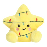 A yellow plush star toy decorated with embroidered Christmas lights and a smiling face, shown on a plain white background.
