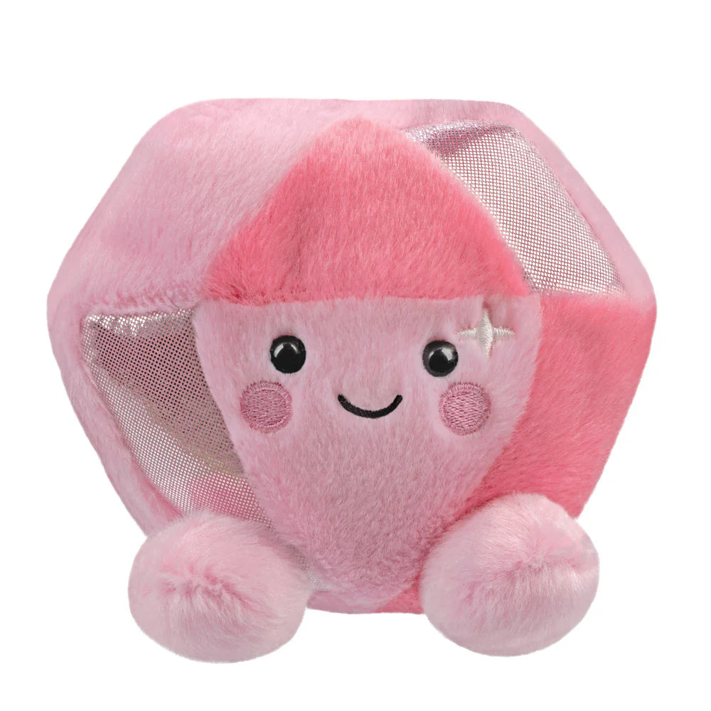Aurora Palm Pals Pink Diamond plush — a pale pink hexagonal gem-shaped soft toy with shimmery mesh facets, a sparkle embroidery detail, rosy cheeks, and a gentle smiling face