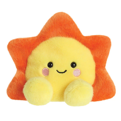Palm Pals Rae Sun plush with yellow centre face and orange star-shaped rays with pink embroidered cheeks